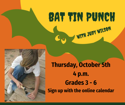 Using a hammer, create a bat tin punch.